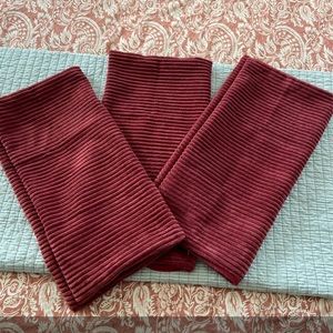 Set of 3 burgundy pillow covers.